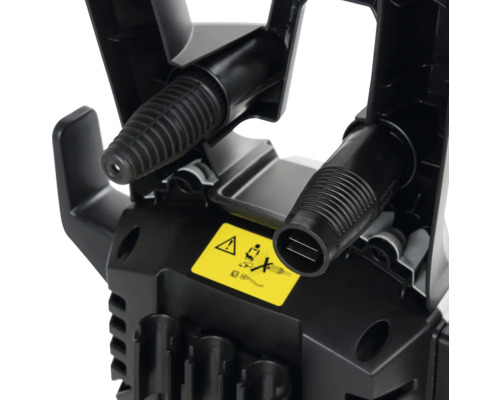 Detailweergave van een hogedrukreinigermondstuk met waarschuwing voor correct gebruik