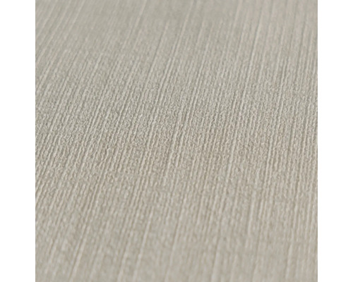 Close-up van een beige behang met linnenstructuur