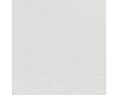 Close-up van een wit behang met fijne structuur