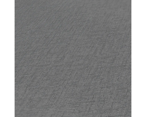 Close-up van een grijs behang met subtiele textuur.