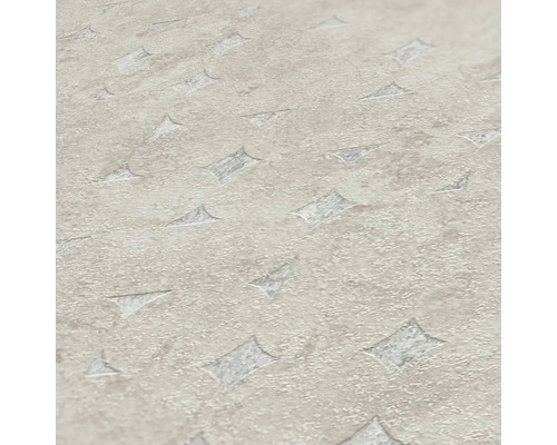 Close-up van een gestructureerd behang met geometrische patronen