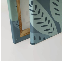 Close-up van canvas schilderij met botanisch motief en houten frame