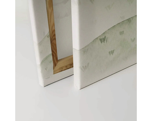 Close-up van twee canvas schilderijen met houten frame