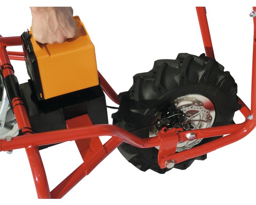 Detailopname van een accu en een band van een gemotoriseerd apparaat