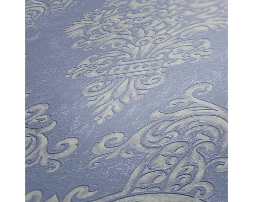 Close-up van een behang met een decoratief patroon