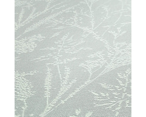 Close-up van een wit behang met plantenmotief