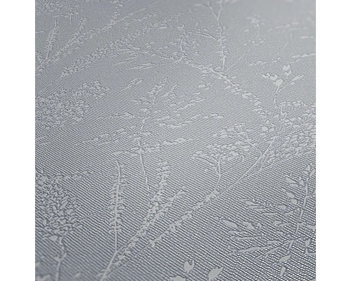 Close-up van een gestructureerd behang met plantenmotief