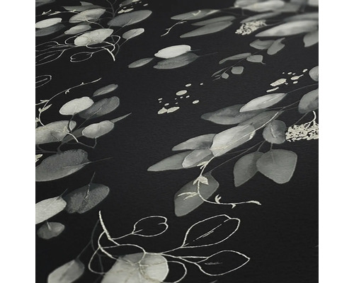 Close-up van een donker oppervlak met bladmotief