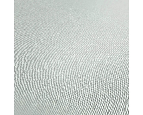 Close-up van een textielbehang met fijne structuur