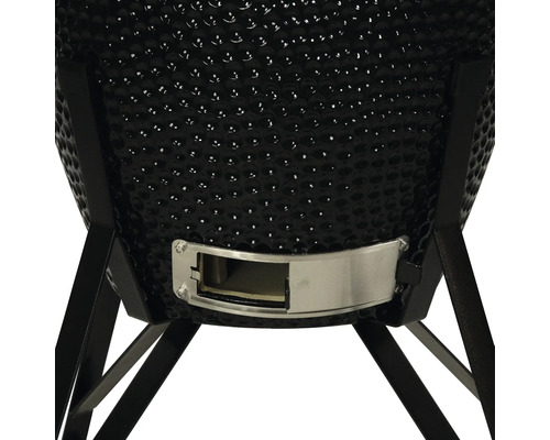 Gedetailleerd beeld van een kamado grill met luchttoevoerregelaar en frame