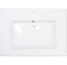 Witte wastafel met kraangat en overloop