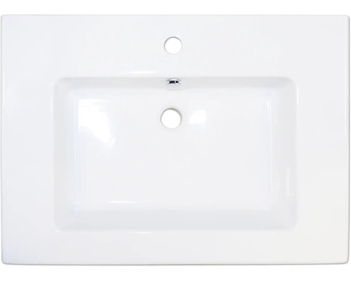 Witte wastafel met kraangat en overloop