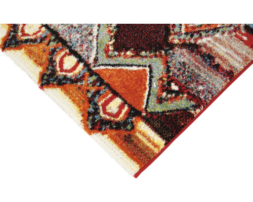 Detail van een tapijt met geometrische patronen