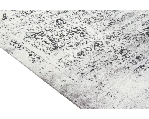 Tapijt met abstract patroon in lichte en donkere tinten