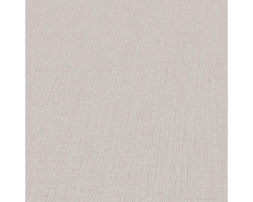 Close-up van een lichtgekleurd behang met lichte textuur