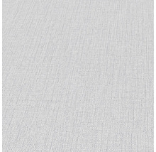 Close-up van een lichtgekleurd textielbehang met fijne structuur