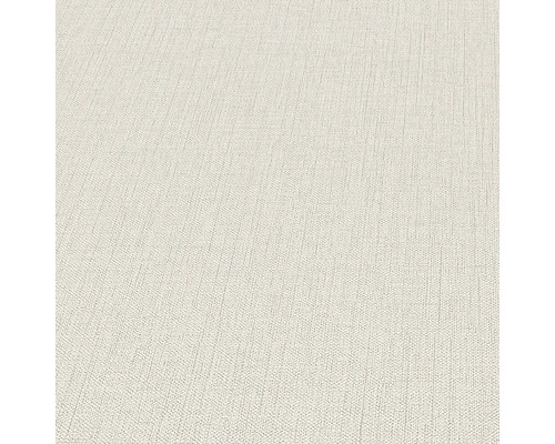 Close-up van een lichtgekleurd textielbehang met fijne structuur