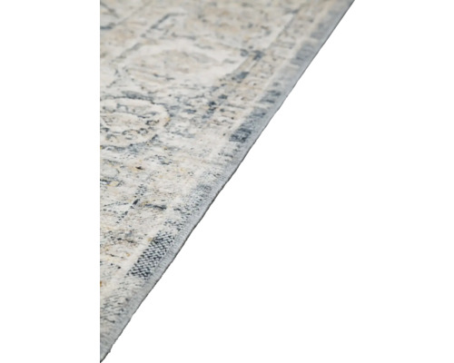 Detailopname van een tapijt met patroon