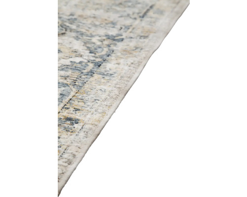 Detailweergave van een tapijt met motief