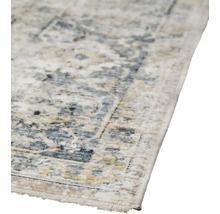 Detailopname van een tapijt met patroon