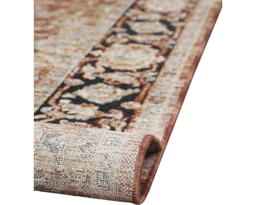 Detailweergave van een gemustereerd tapijt