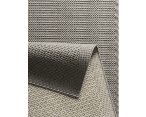 Grijs tapijt met geweven patroon