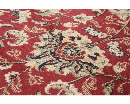 Close-up van een tapijt met bloemmotief