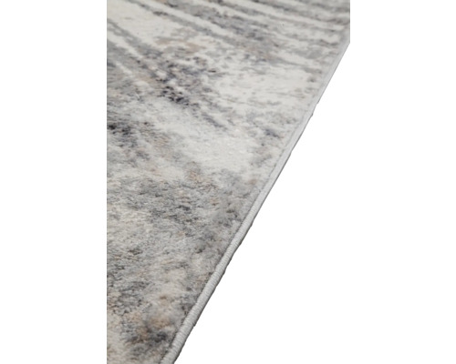 Detail van een tapijt met abstract patroon