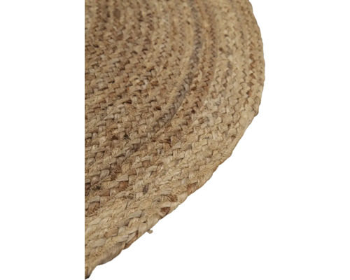 Detail van een rond vloerkleed van jute.