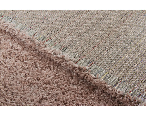 Detailopname van een shaggy vloerkleed met lange pool