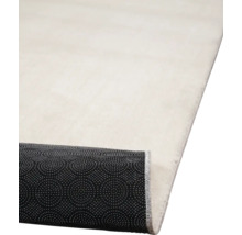 Tapijt met opgerolde rand en antislip onderkant.