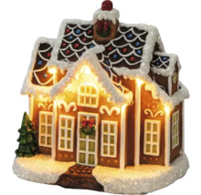 Peperkoekhuis met verlichting en decoratie