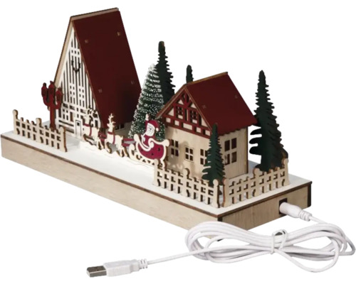 Decoratieve kerstscène met huizen, bomen, slee en USB-kabel