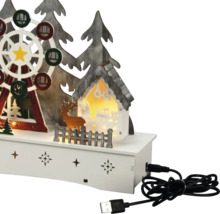 Kerstdecoratie met reuzenrad, huis en USB-kabel