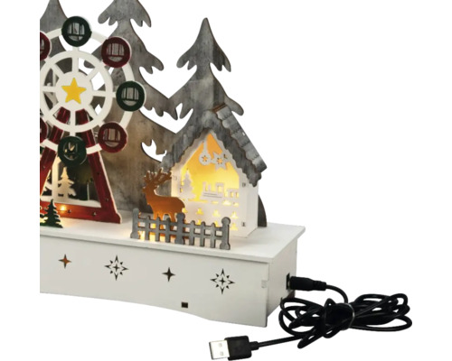 Kerstdecoratie met reuzenrad, huis en USB-kabel