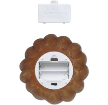 Batterijcompartiment van een decoratieve lamp in koekjesvorm