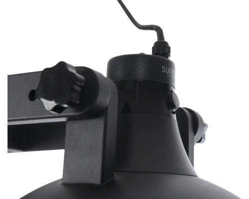 Gedetailleerde opname van een zwarte lamp met draaiknop