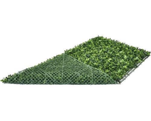 Kunstgrasmat met bladeren en rasterstructuur aan de achterkant.