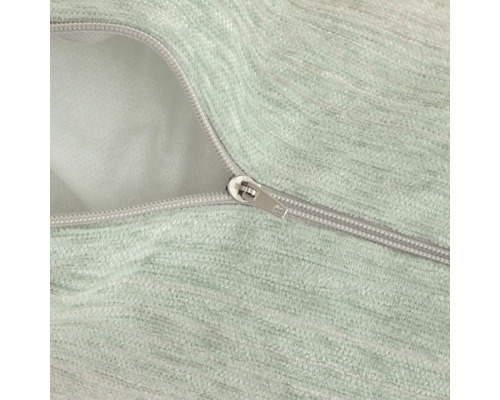 Detailopname van een ritssluiting op een kussenhoes