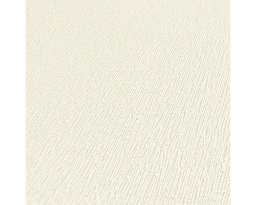 Close-up van een lichtkleurig structuurbehang.