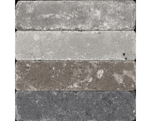 Vier betonnen straatstenen in verschillende grijstinten