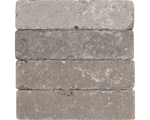 Vier grijze straatklinkers van steen