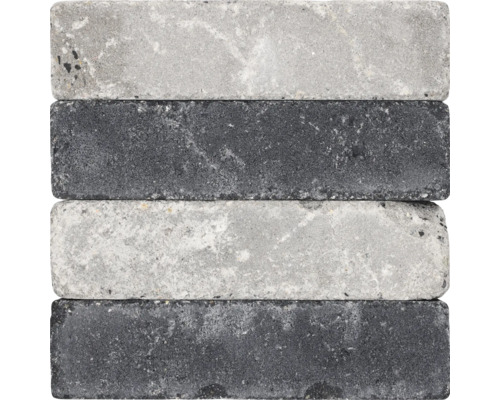 Gestapelde rechthoekige natuursteenbakstenen in grijs en zwart
