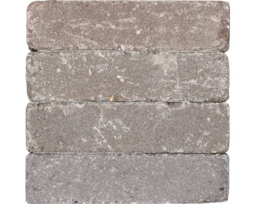 Vier grijze straatbakstenen van beton