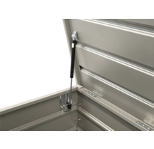 Detailopname van een open gereedschapskist met gasveer