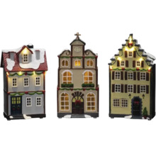 Drie decoratieve kersthuisjes met verlichting