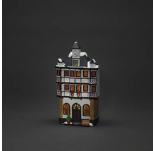 Decoratief gebouw met klok voor de kerstperiode