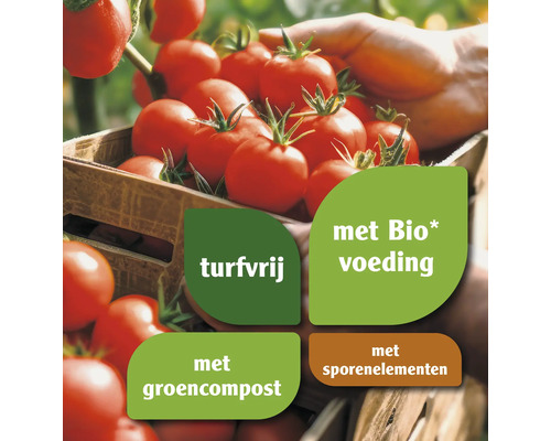 Tomaten in een krat met informatie over turfvrije, biologische voeding, groencompost en sporenelementen