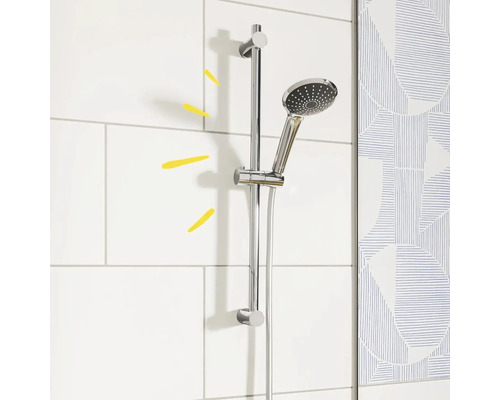 Douchestang met handdouche aan de muur