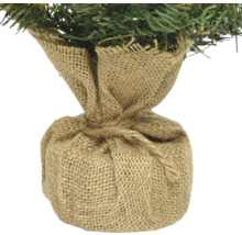 Decoratieve mini-kerstboom in jute zak